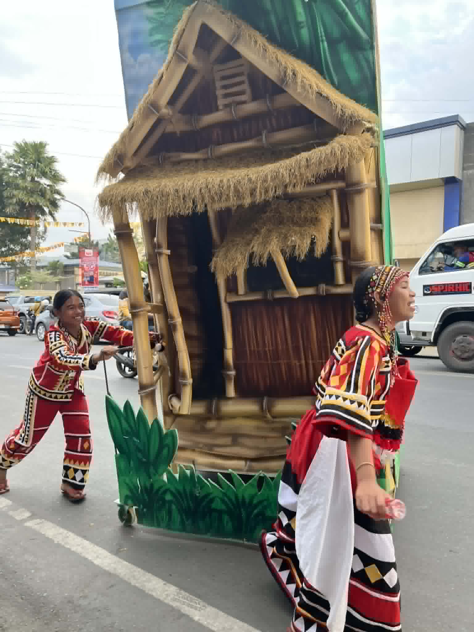 Aftermath: Performers use the street again to return props, materials to base